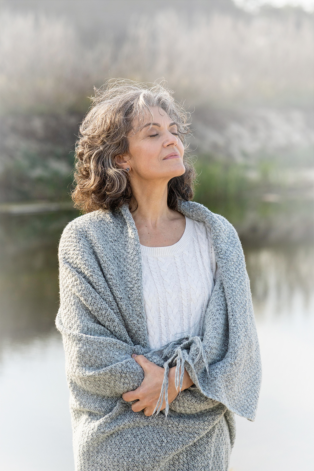 portrait-older-woman-outdoors-by-lake